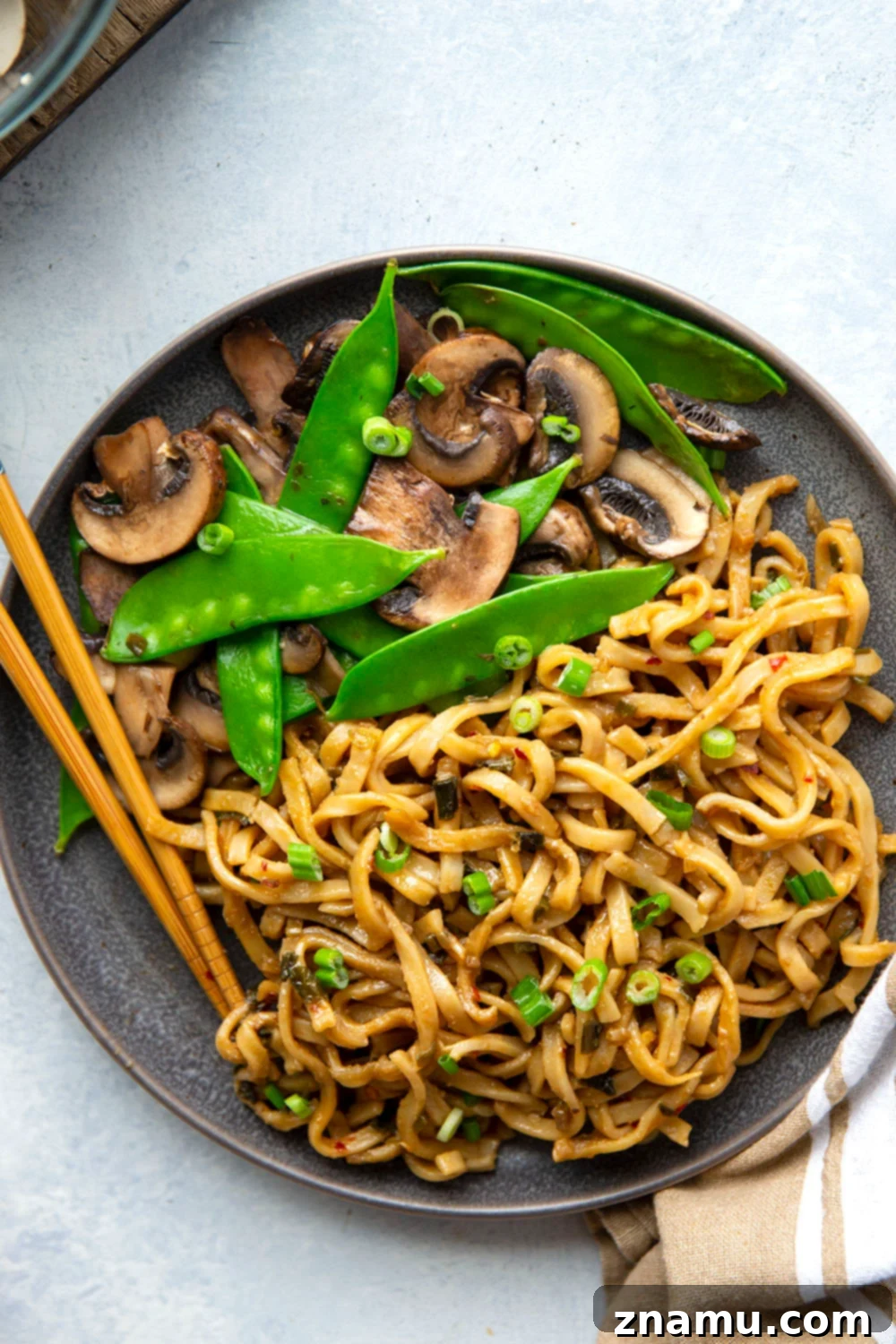 Fiery Miso Scallion Noodles 4 A close-up view of the spicy scallion miso sauce simmering in a skillet, with finely chopped scallions and garlic visible.