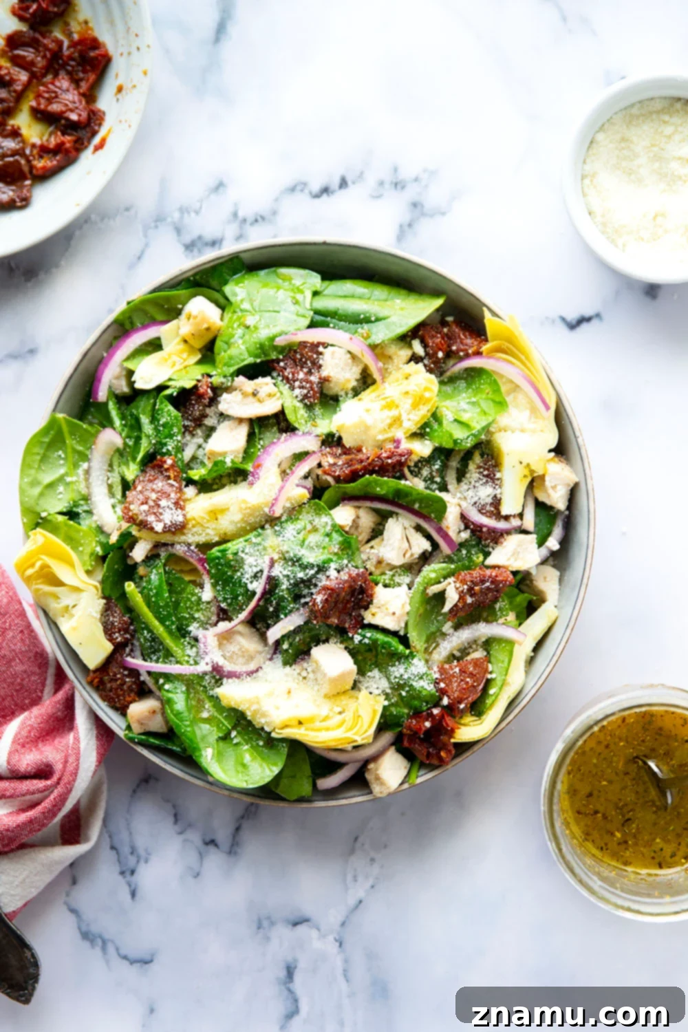 Sun-Kissed Tuscan Chicken & Spinach Salad 2 Vibrant Sun-Dried Tomato Spinach Chicken Salad with homemade Italian vinaigrette