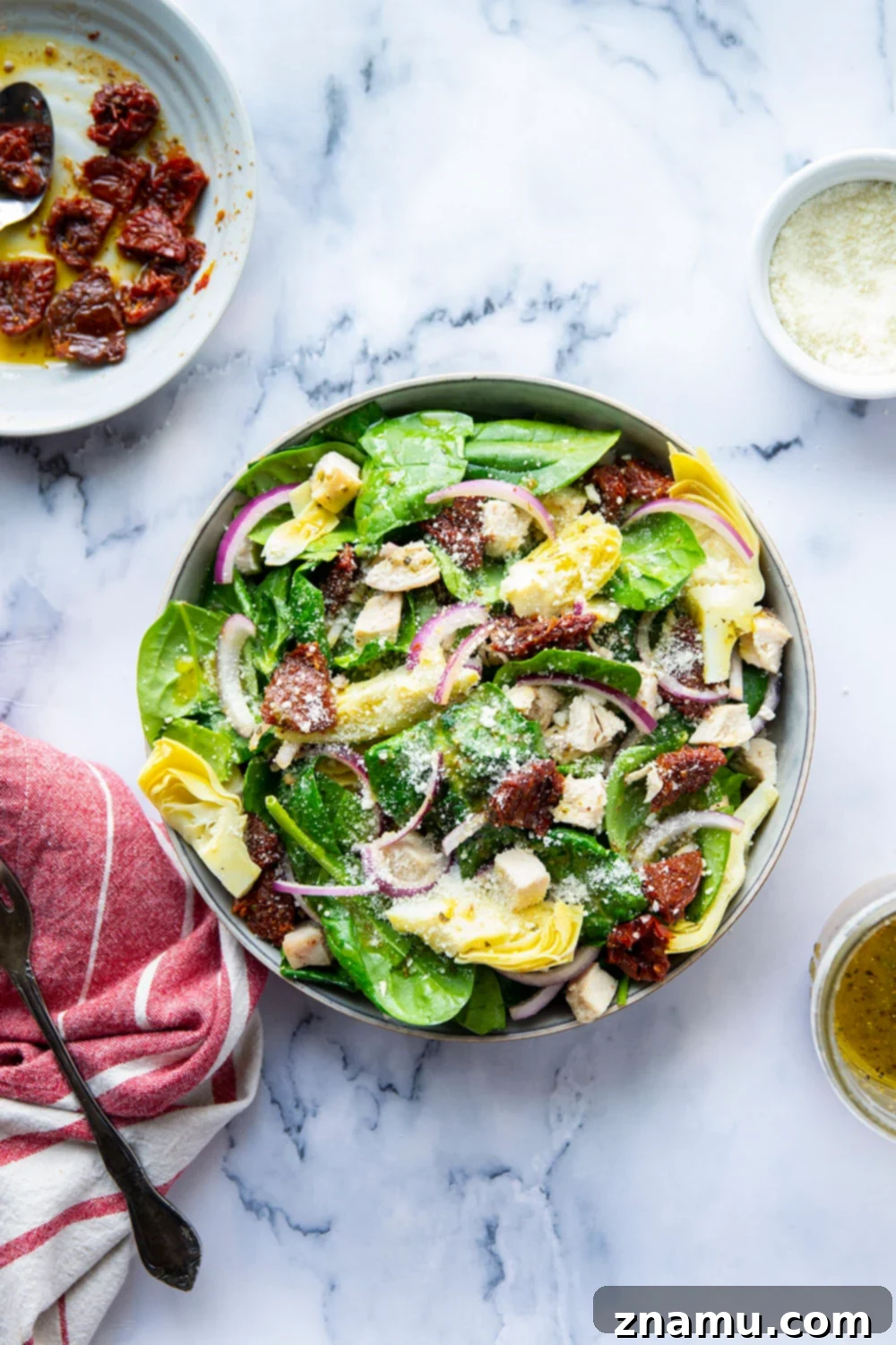 Sun-Kissed Tuscan Chicken & Spinach Salad 5 Assortment of fresh and prepared ingredients for Sun-Dried Tomato Spinach Chicken Salad