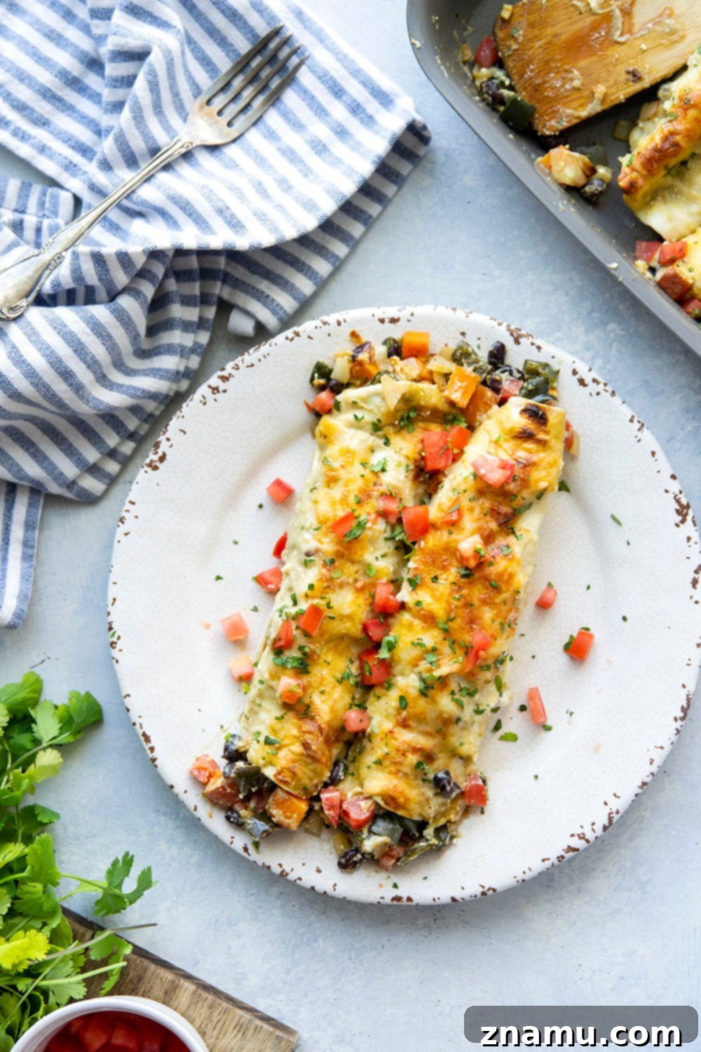 Savory Breakfast Enchiladas with Poblano Sweet Potato and Black Beans 6 These sweet potato black bean breakfast enchiladas are packed with all the savory breakfast works and smothered in a perfectly creamy green enchilada sauce. - the best hearty breakfast!