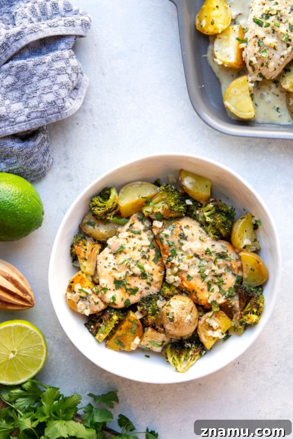 Flavorful Cilantro Lime Chicken & Roasted Veggies 2 Creamy Cilantro Lime Chicken with roasted baby potatoes and broccoli, an easy sheet pan dinner.