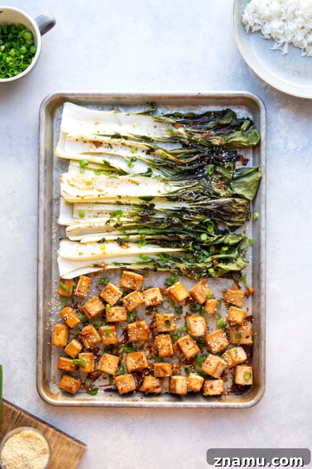 Savory Miso Tofu with Crisp Bok Choy 3 This miso baked tofu features tofu cubes marinated in a flavorful miso sauce and roasted alongside tender bok choy on one sheet pan. Serve this tofu and bok choy over hot rice with lots of sesame seeds and scallions!