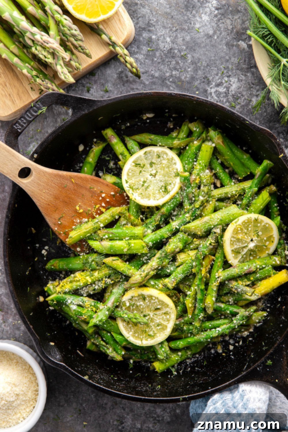 Bright Lemon Garlic Asparagus 2 Tender asparagus is cooked on the stovetop with garlic, dill, and lots of fresh lemon in this easy sautéed lemon garlic asparagus!