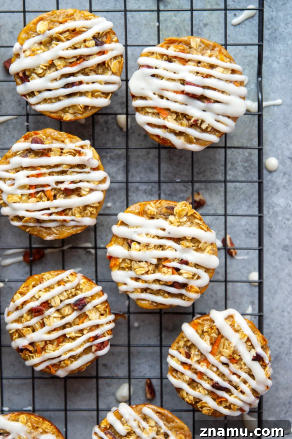 Breakfast Carrot Cake Oatmeal Cups 3 Close-up of Carrot Cake Baked Oatmeal Cups, showcasing the moist interior and pecan pieces, perfect for a healthy breakfast.