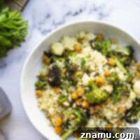 Tossed with crispy roasted chickpeas and broccoli, this lemon couscous is bursting with fresh lemon flavor and an easy spring side dish that's ready in only 35 minutes!