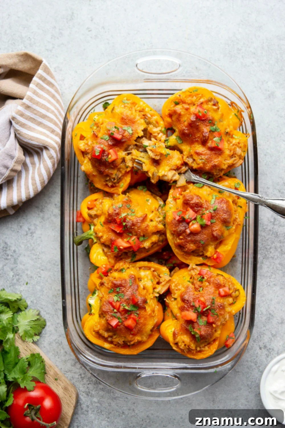 Enchilada Chicken Pepper Boats 2 Delicious chicken enchilada stuffed bell peppers, baked to perfection and topped with cheese.