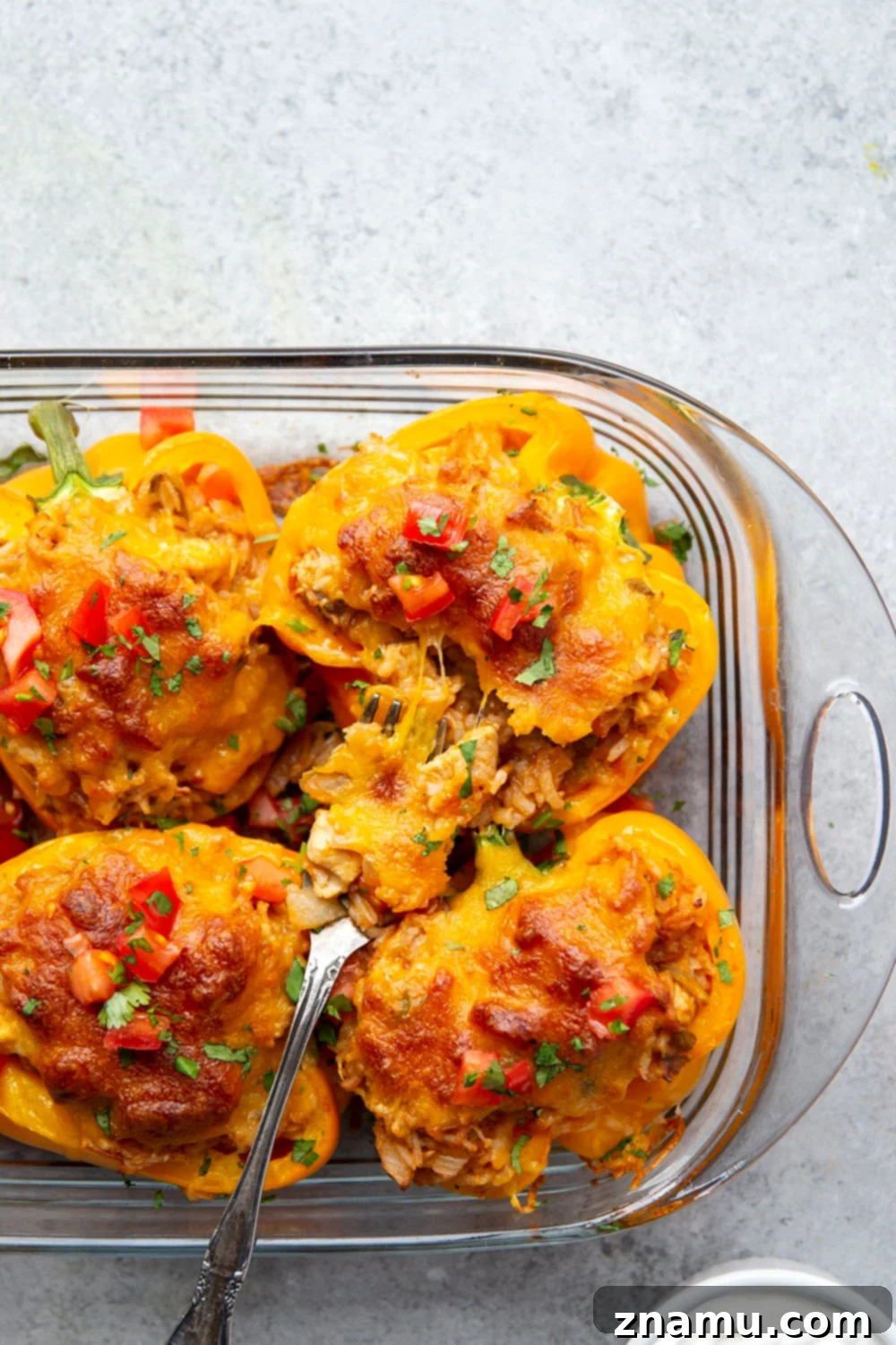 Enchilada Chicken Pepper Boats 5 Assorted colorful bell peppers, ideal for stuffing with flavorful chicken enchilada mix.