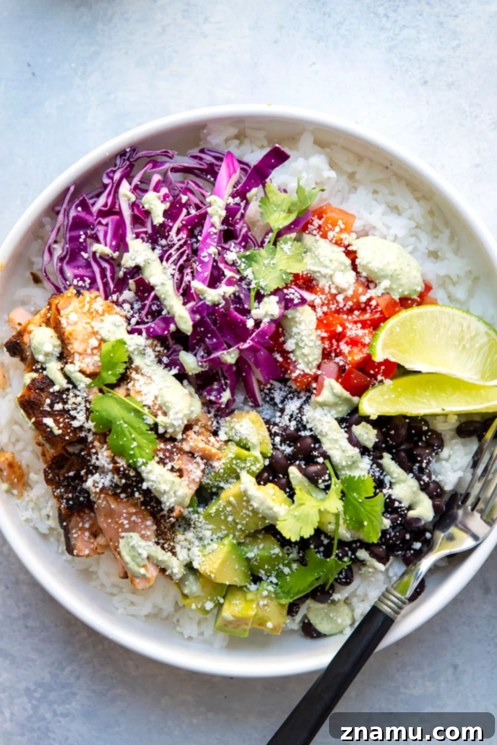 Fiesta Salmon Taco Bowls 6 These salmon taco bowls feature everything you love about a fish taco in rice bowl form! Loaded with lots of spicy blackened salmon, hearty rice, a creamy tahini cilantro sauce, and all your favorite toppings.