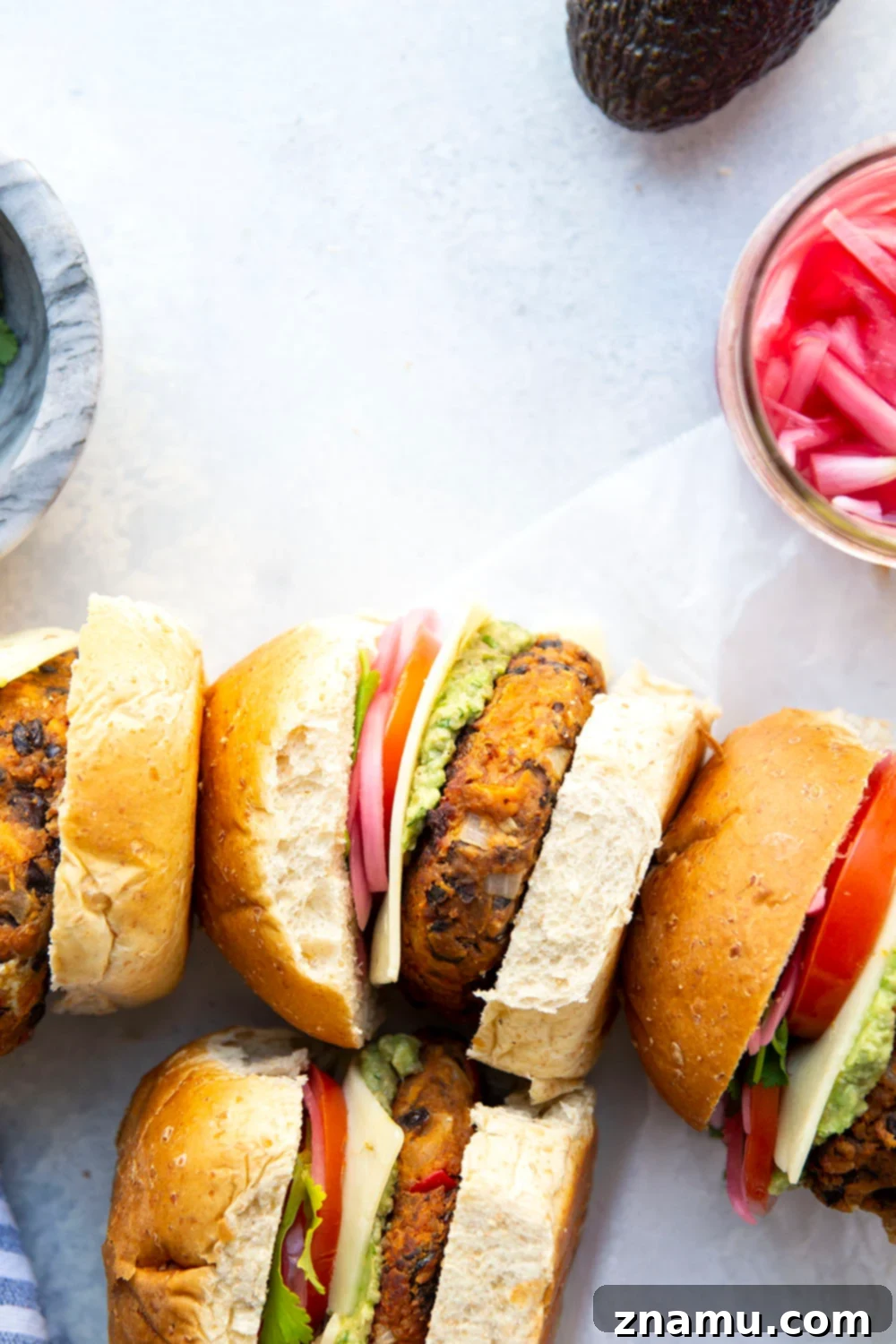 Zesty Southwest Sweet Potato Black Bean Burgers 3 Perfectly hearty and loaded with southwest-style spices and creamy avocado, these sweet potato black bean burgers are so easy to make and amazing stuffed between a bun with all your favorite burger toppings.