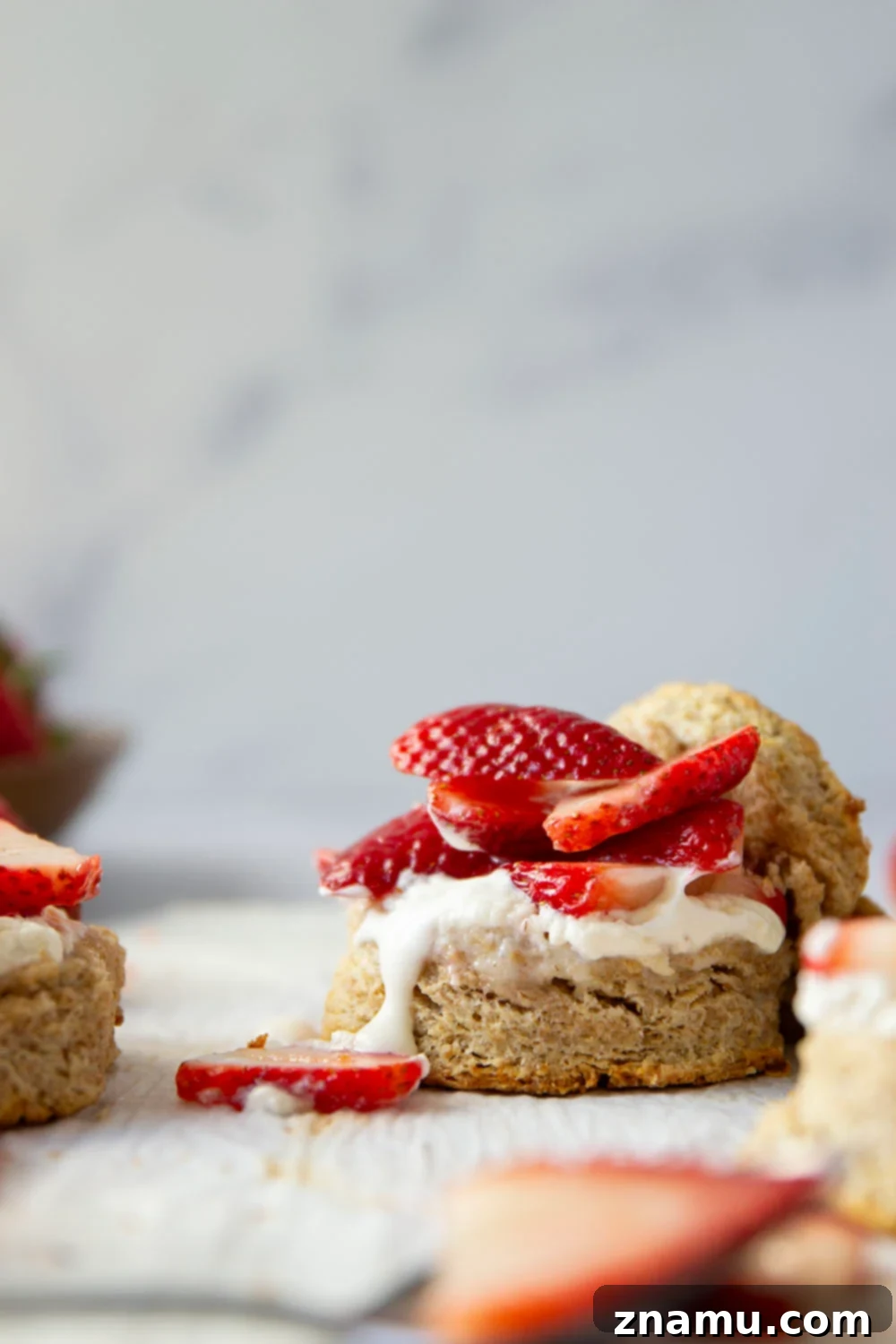 Rustic Whole Wheat Strawberry Shortcake 4 This whole wheat strawberry shortcake features rustic whole wheat biscuits cracked open warm and served with a sweet strawberry sauce and lots of fluffy whipped cream.