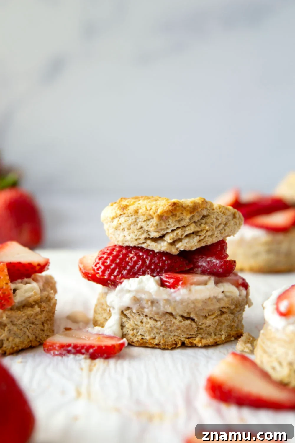 Rustic Whole Wheat Strawberry Shortcake 5 This whole wheat strawberry shortcake features rustic whole wheat biscuits cracked open warm and served with a sweet strawberry sauce and lots of fluffy whipped cream.