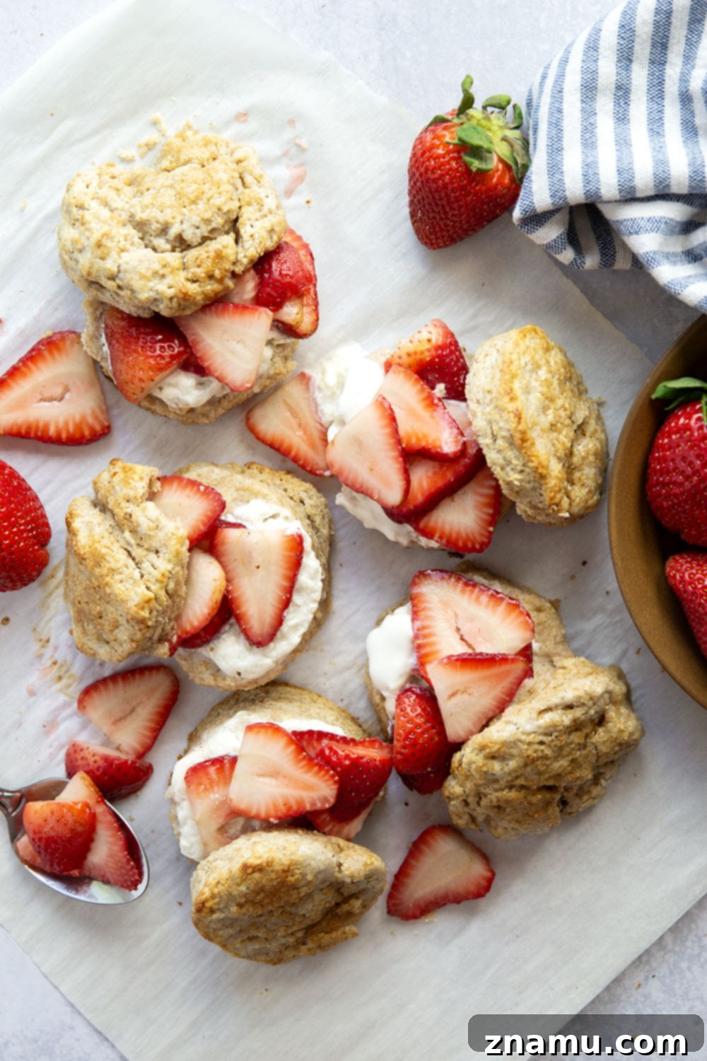 Rustic Whole Wheat Strawberry Shortcake 6 This whole wheat strawberry shortcake features rustic whole wheat biscuits cracked open warm and served with a sweet strawberry sauce and lots of fluffy whipped cream.