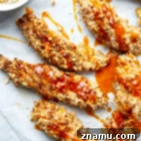 Crispy Air Fryer Pretzel Crusted Chicken Tenders with Hot Honey Glaze