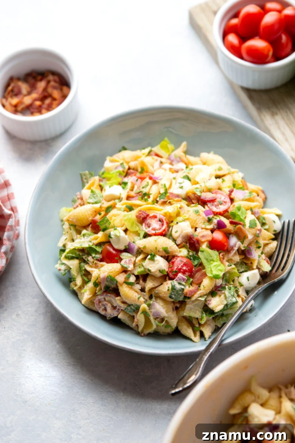 This BLT pasta salad features all the things you love about the classic sandwich in pasta salad form with a spicy chipotle buttermilk ranch dressing!