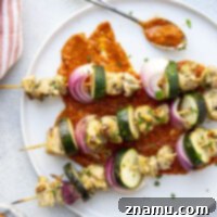 Sun-Kissed Chicken Skewers with Smoky Romesco 8 Marinated in lots of fresh lemon and garlic and served with a flavorful homemade romesco sauce for dipping, these grilled lemon garlic chicken kabobs are perfect for any summer cookout!