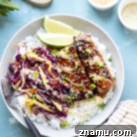 Sweet & Savory Teriyaki Salmon Bowls with a Zesty Mango Kick 8 These teriyaki salmon bowls feature smoky grilled salmon marinated in a flavorful homemade teriyaki sauce and served in rice bowls with lots of spicy mango slaw.