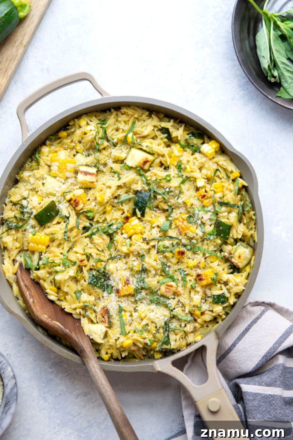 Grilled Zucchini & Sweet Corn Pesto Orzo 3 Close-up of Pesto Zucchini Orzo, showcasing tender orzo, charred corn, and zucchini in a creamy pesto sauce