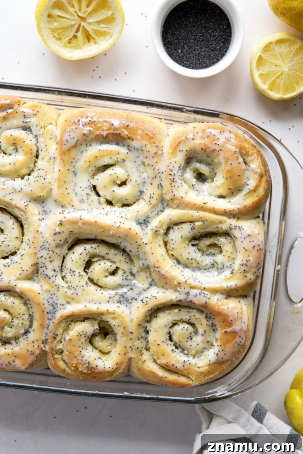 Glazed Lemon Poppy Seed Rolls 2 Soft, melt-in-your-mouth lemon poppyseed sweet rolls are speckled with pretty poppyseeds in every bite and glazed with a sweet and tangy fresh lemon icing.