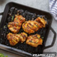Smoky Chipotle Grilled Chicken Thighs 8 Marinated in a flavorful spicy chipotle sauce and grilled to juicy perfection, these chipotle marinated chicken thighs will quickly become a cookout favorite!