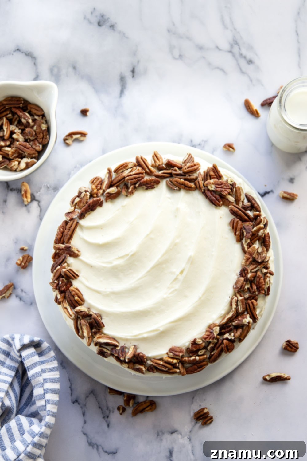 Taste of the Tropics, Southern Style 3 Slices of Hummingbird Cake showing layers of moist cake with banana and pineapple pieces, and a generous filling of cream cheese frosting.