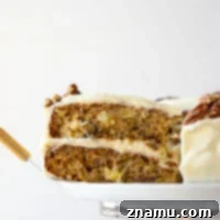 Hummingbird Cake, a delectable dessert with banana, pineapple, pecans, and cream cheese frosting.