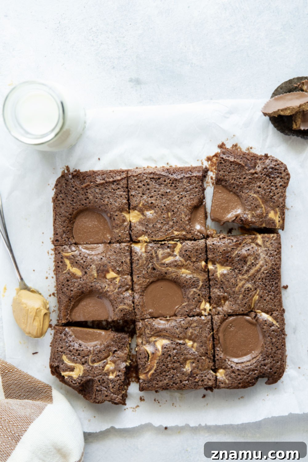 Swirled Peanut Butter Chocolate Brownies 4 Freshly baked brownies cooling on a rack, highlighting the perfect peanut butter swirls.