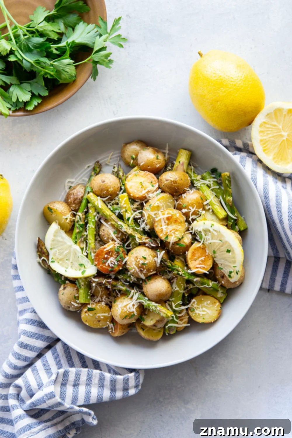 Bright Lemon Roasted Asparagus and Potatoes 4 Fresh baby potatoes and green asparagus, prepped and ready for roasting.