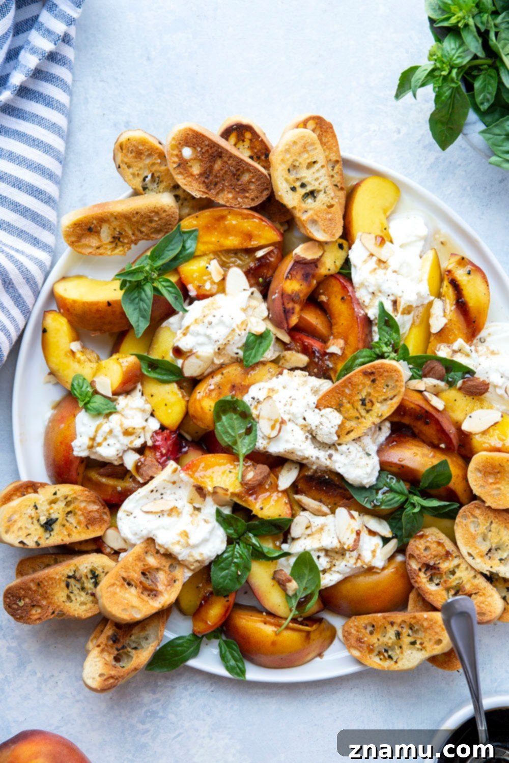 Smoky Grilled Peaches with Creamy Burrata 2 Tender grilled peaches and creamy burrata cheese are a match made in heaven in this summery appetizer! Serve these peaches and burrata with lots of toasted crostini for dipping.