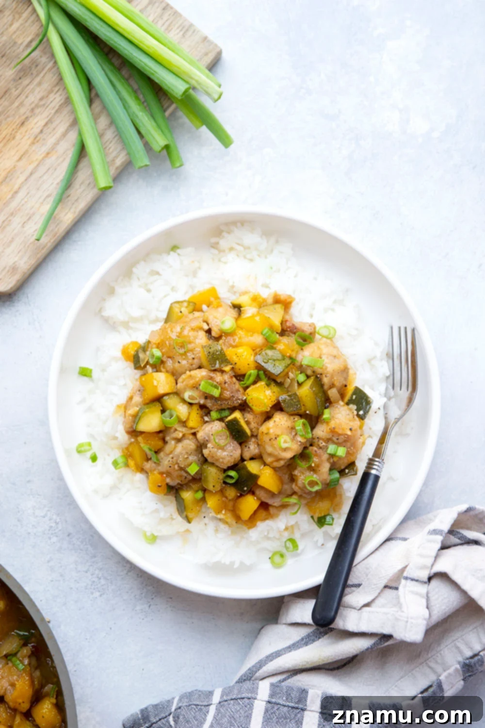 Mango Glazed Chicken with Garden Zucchini 3 Loaded with fresh mango and coated in a perfectly sticky sauce, this chicken and zucchini comes together in only one skillet and is fantastic over rice!