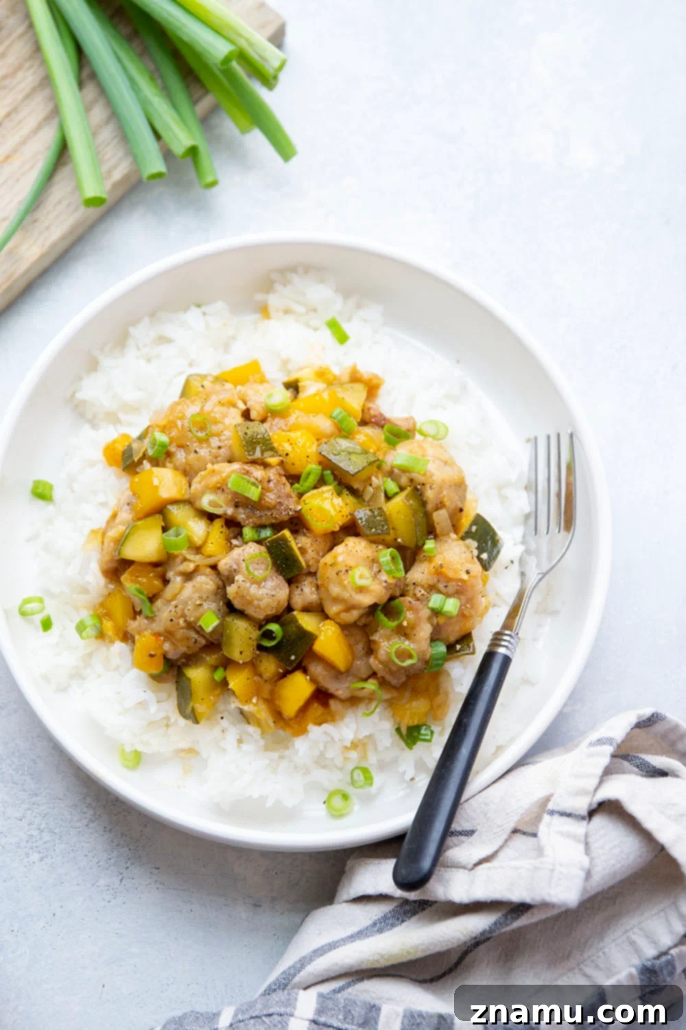 Mango Glazed Chicken with Garden Zucchini 5 Loaded with fresh mango and coated in a perfectly sticky sauce, this chicken and zucchini comes together in only one skillet and is fantastic over rice!