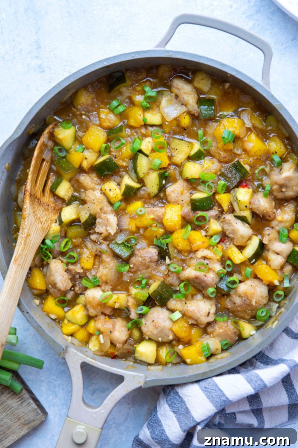 Mango Glazed Chicken with Garden Zucchini 6 Loaded with fresh mango and coated in a perfectly sticky sauce, this chicken and zucchini comes together in only one skillet and is fantastic over rice!