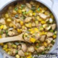 Loaded with fresh mango and coated in a perfectly sticky sauce, this chicken and zucchini comes together in only one skillet and is fantastic over rice!