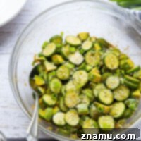 Vibrant Asian Cucumber Avocado Medley 8 This Asian-style cucumber salad features crisp cucumbers and silky avocado tossed in an incredible savory and spicy gochujang vinaigrette.