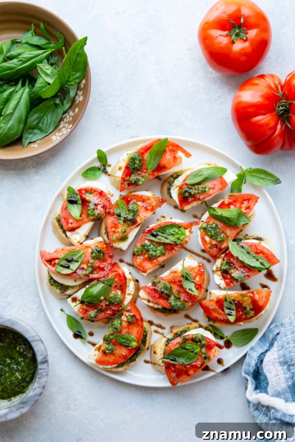 Fresh Basil Pesto Caprese Bruschetta 3 Platter of Caprese Bruschetta ready to serve, showcasing vibrant colors