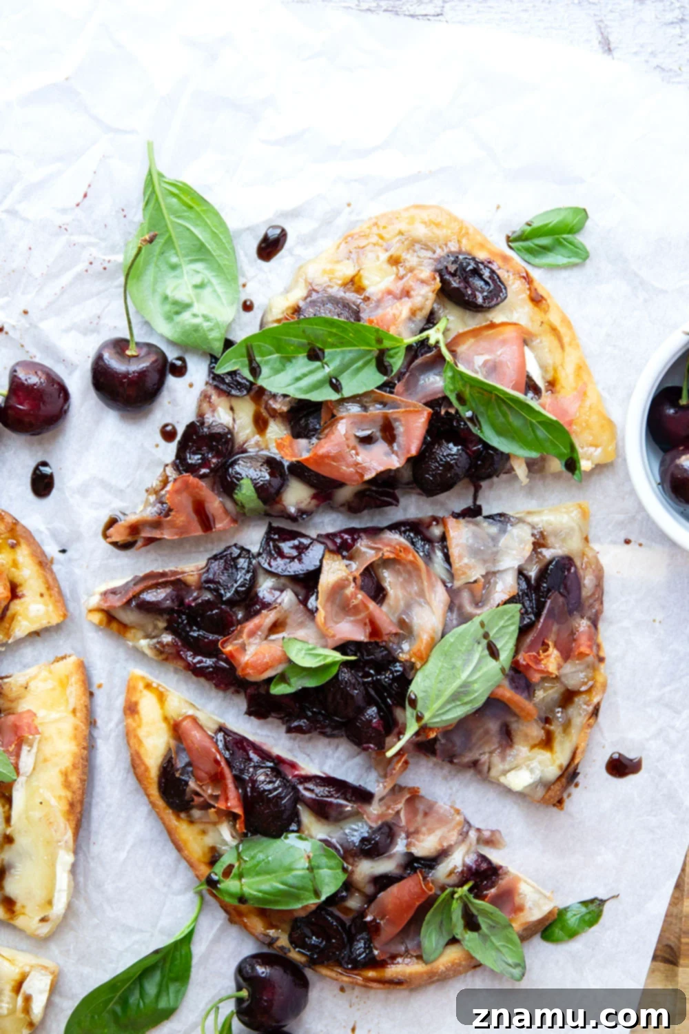 Artisan Cherry Prosciutto Flatbread 2 Juicy roasted cherries and salty prosciutto are the ultimate combo in this simple, yet stunning flatbread. An easy appetizer for entertaining and so good with summer cherries!
