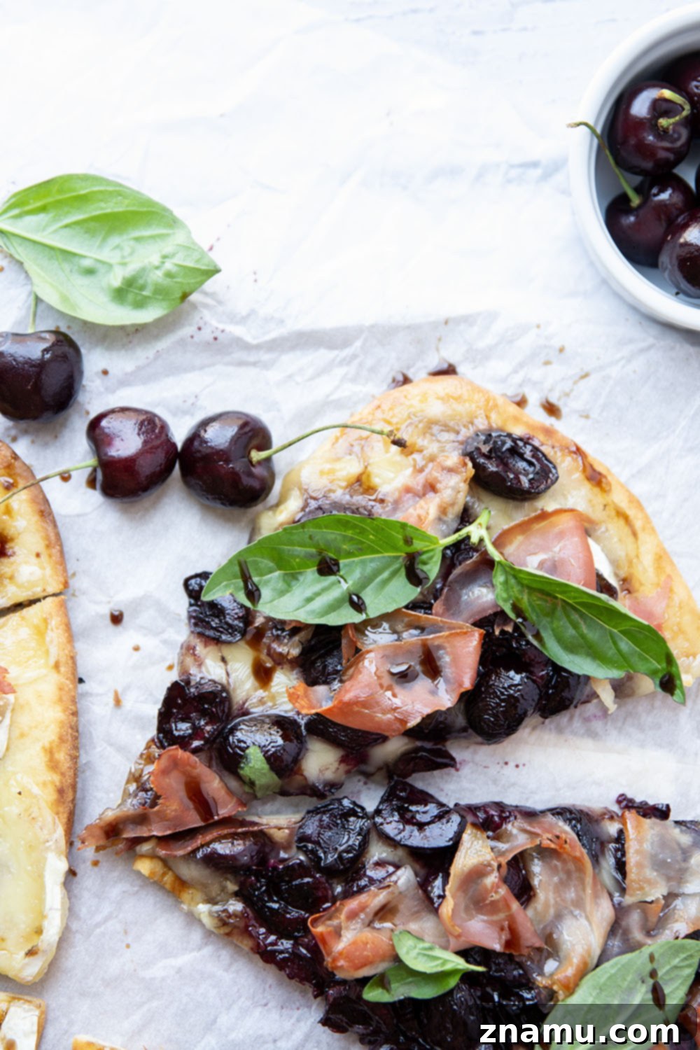 Artisan Cherry Prosciutto Flatbread 3 Juicy roasted cherries and salty prosciutto are the ultimate combo in this simple, yet stunning flatbread. An easy appetizer for entertaining and so good with summer cherries!