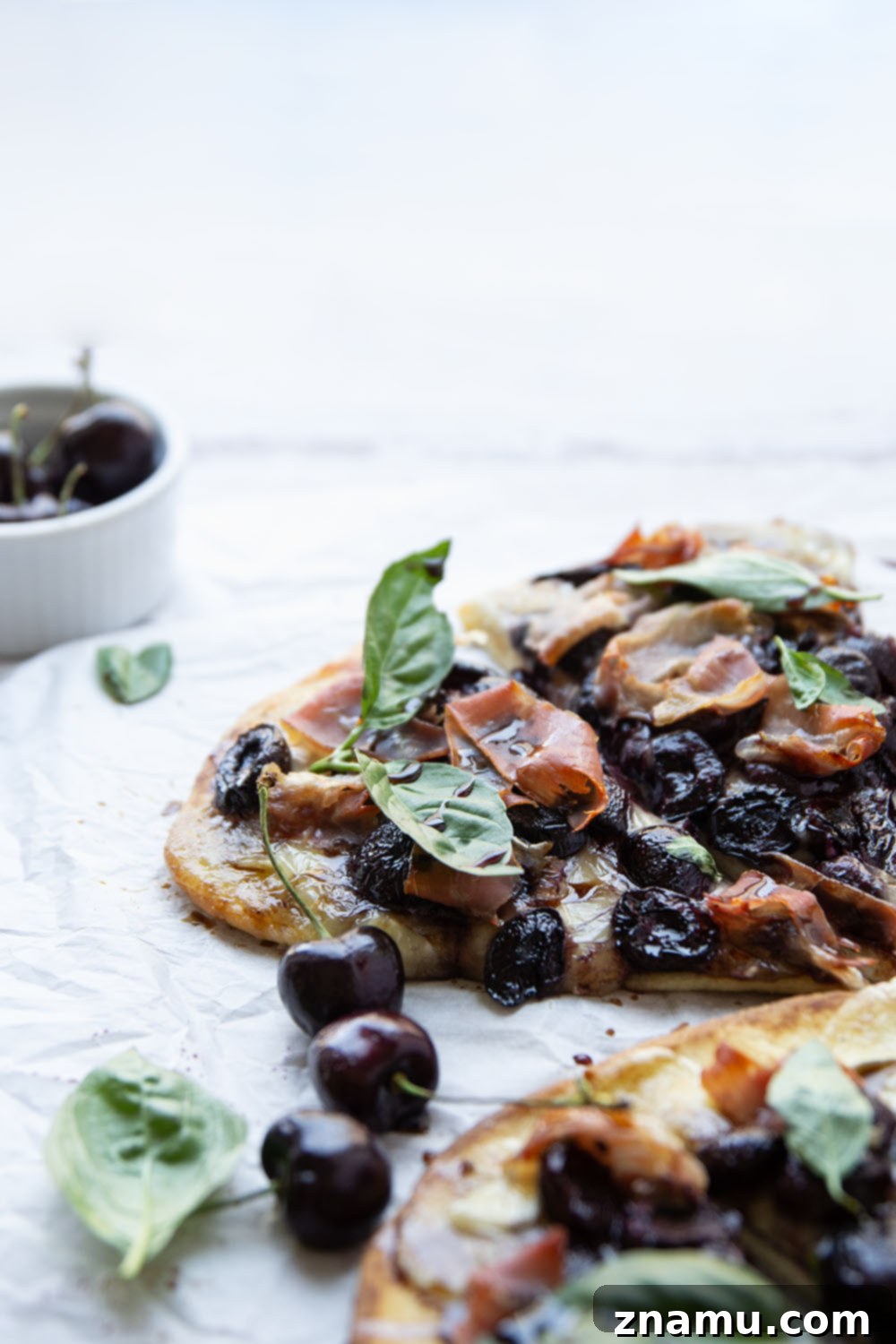 Artisan Cherry Prosciutto Flatbread 4 Juicy roasted cherries and salty prosciutto are the ultimate combo in this simple, yet stunning flatbread. An easy appetizer for entertaining and so good with summer cherries!
