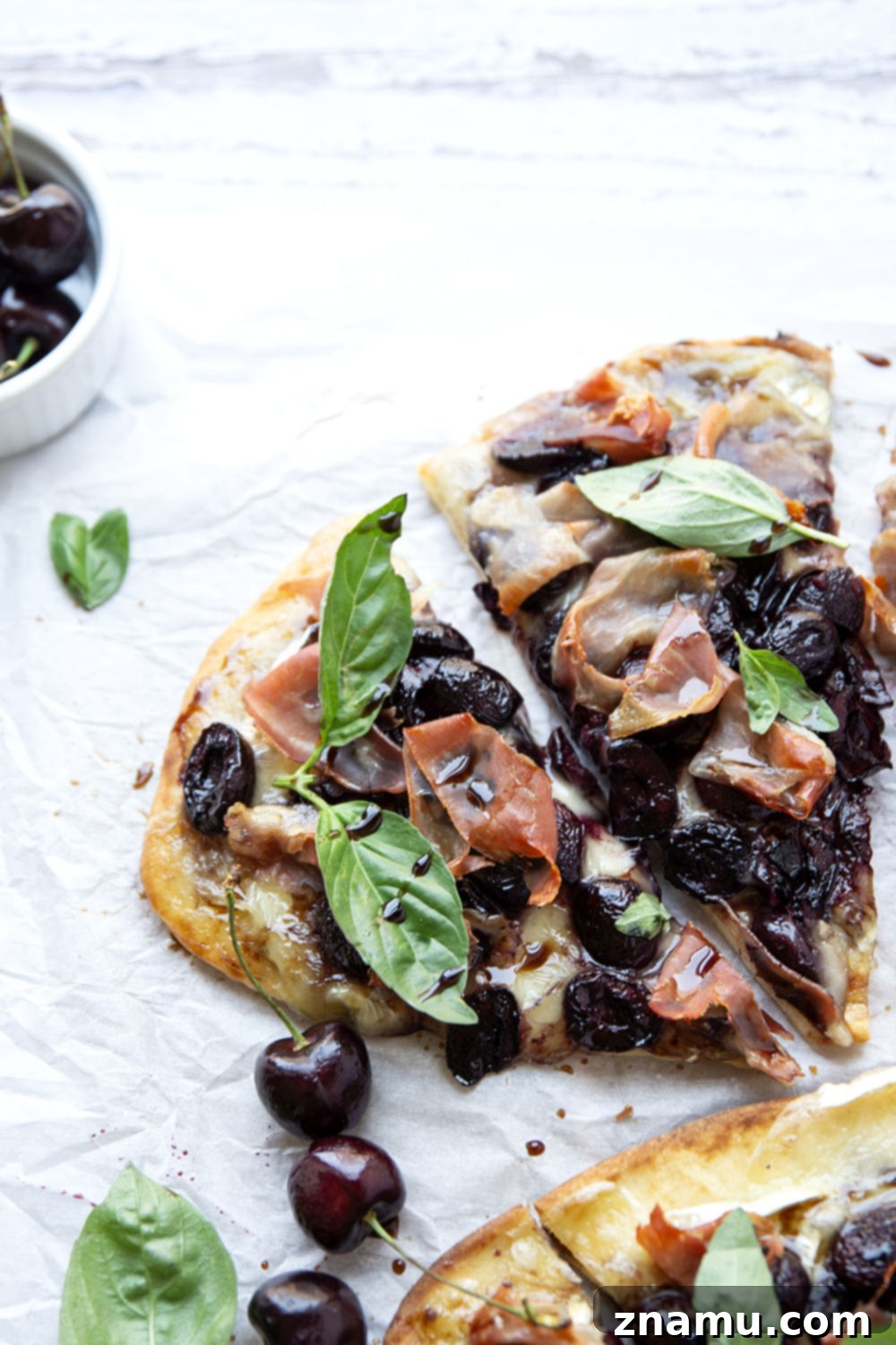 Artisan Cherry Prosciutto Flatbread 6 Juicy roasted cherries and salty prosciutto are the ultimate combo in this simple, yet stunning flatbread. An easy appetizer for entertaining and so good with summer cherries!