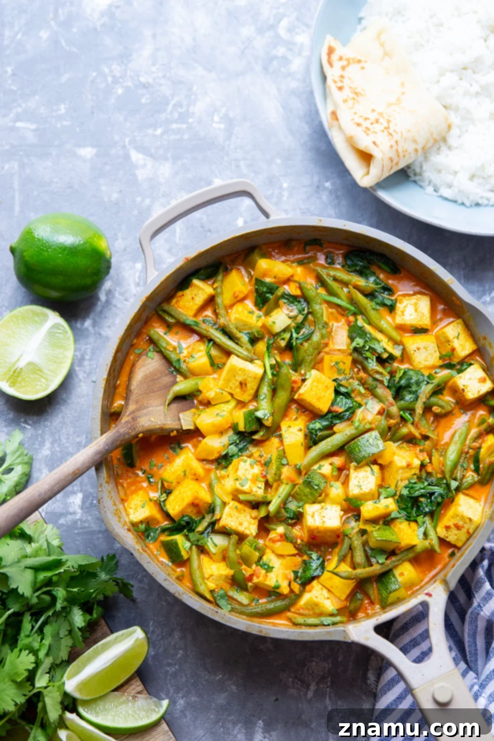 Fresh Summer Tofu Red Curry 4 Ingredients for Tofu Red Curry, including fresh ginger, garlic, red curry paste, and various summer vegetables.