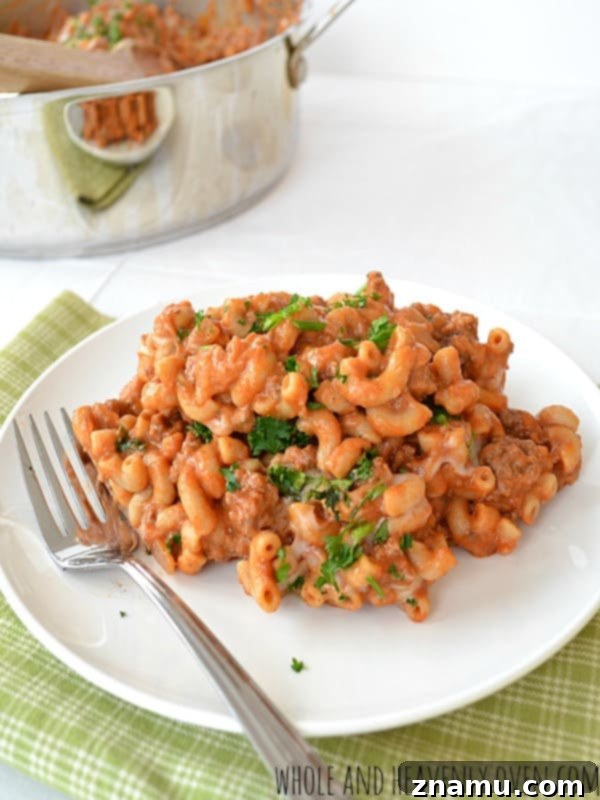 Chili Macaroni and Cheese Skillet 11 Family-favorite Skillet Chili Macaroni & Cheese in a serving dish