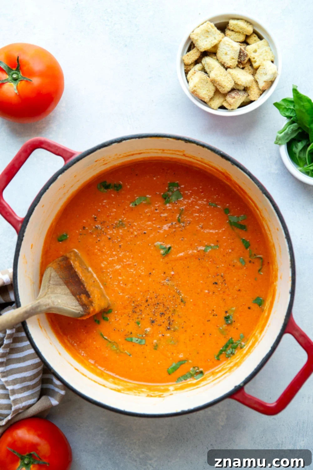 Crimson Fire-Roasted Tomato & Pepper Bisque 3 Close-up of the smooth, velvety texture of homemade roasted red pepper tomato soup, perfect for dipping or enjoying on its own.