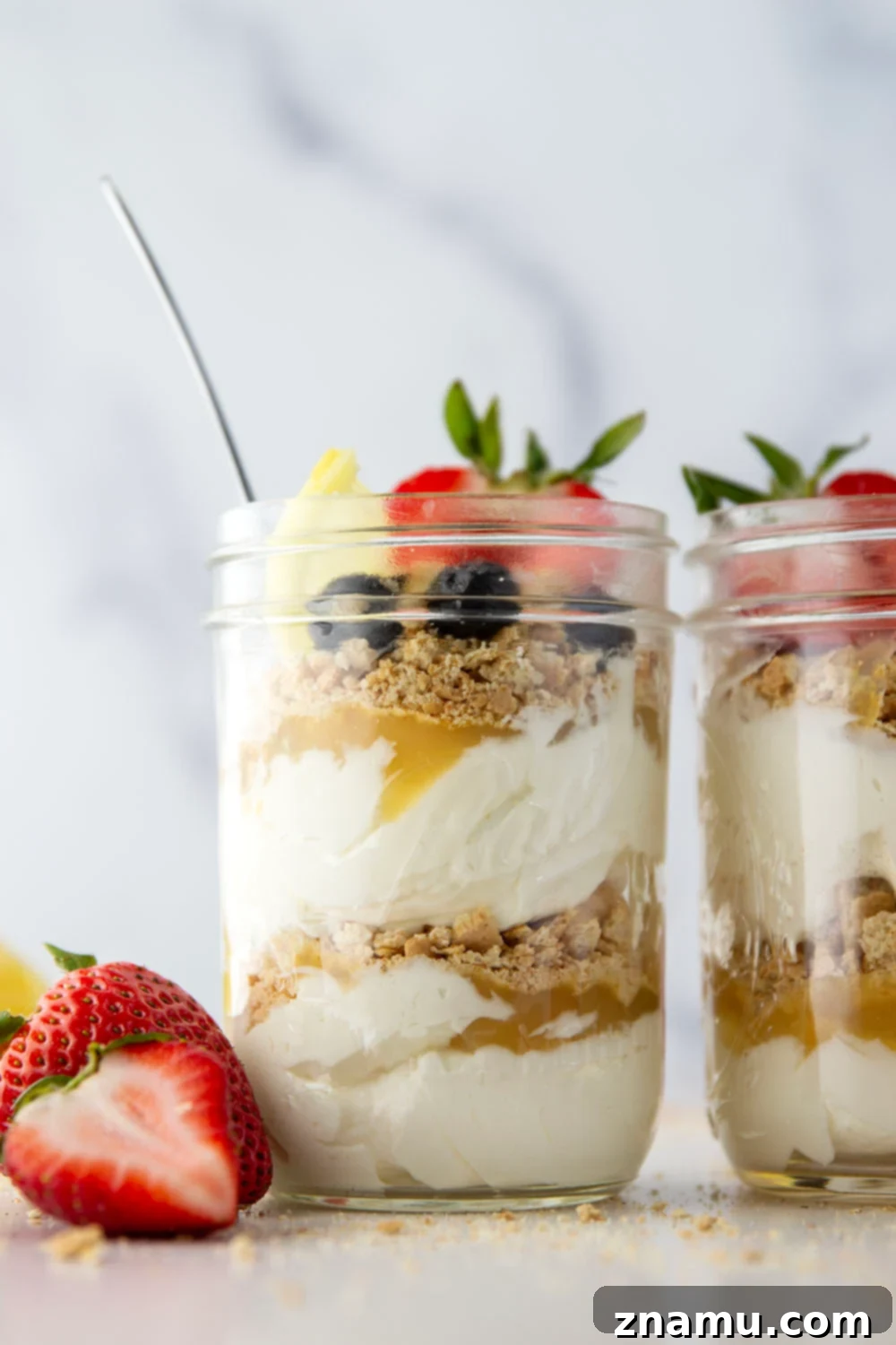 Effortless Lemon Cheesecake Parfaits 2 Layers upon layers of luscious lemon cheesecake, graham crackers, and lemon curd star in these no bake lemon cheesecake parfaits!