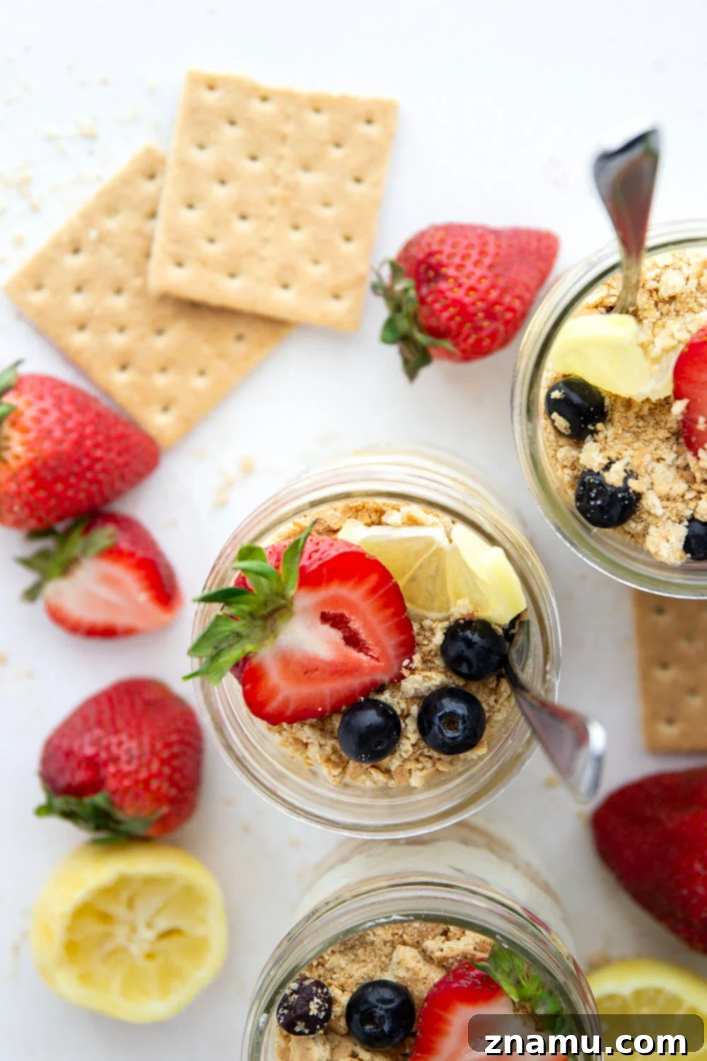 Effortless Lemon Cheesecake Parfaits 3 Layers upon layers of luscious lemon cheesecake, graham crackers, and lemon curd star in these no bake lemon cheesecake parfaits!