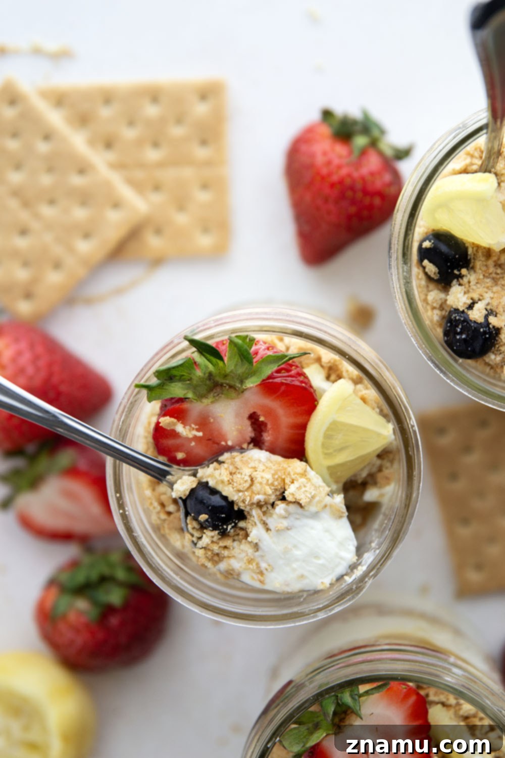 Effortless Lemon Cheesecake Parfaits 5 Layers upon layers of luscious lemon cheesecake, graham crackers, and lemon curd star in these no bake lemon cheesecake parfaits!