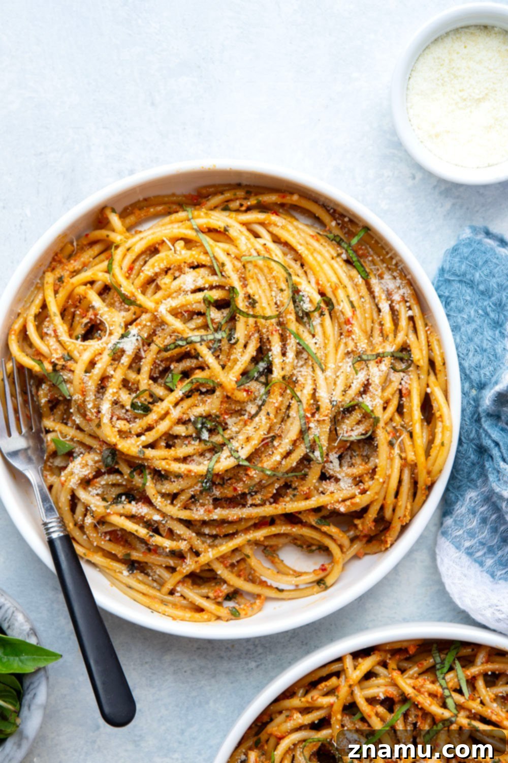 Fire-Roasted Red Pepper Pesto Pasta 2 Flavorful roasted red peppers and lots of fresh basil take this roasted red pepper pesto pasta to the next level! Try it with your favorite pasta with lots of Parmesan cheese on top.