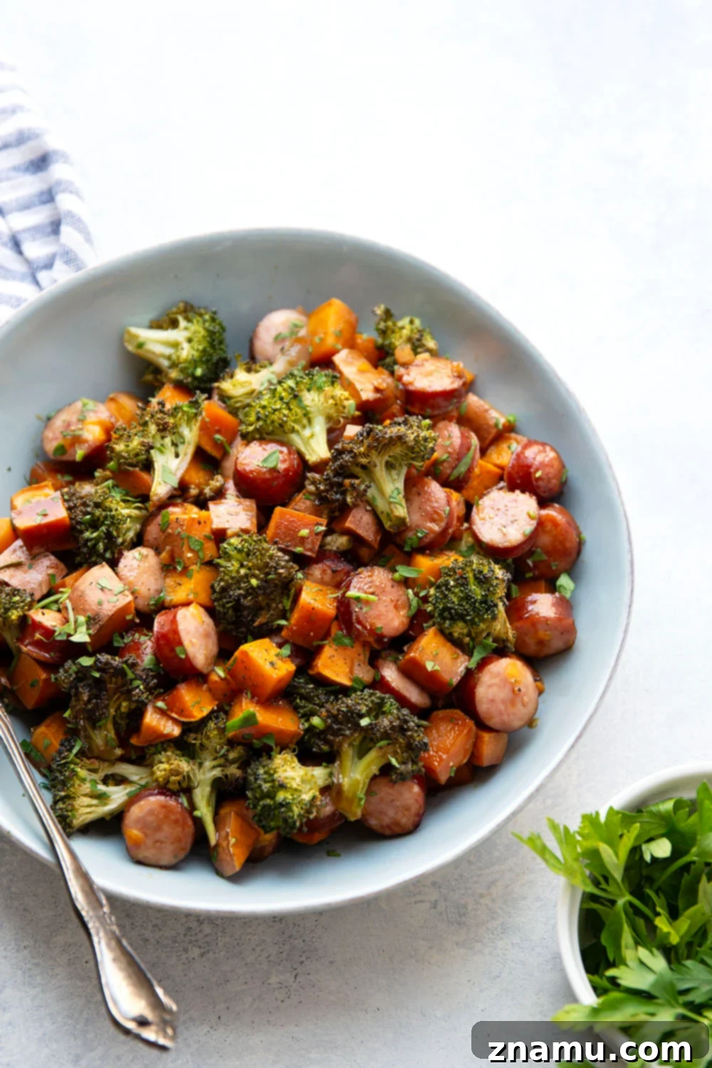 Sticky Honey Garlic Sheet Pan Sausage and Sweet Potatoes 6 Delicious and healthy sheet pan meal with sausage, sweet potatoes, and broccoli glazed in honey garlic sauce.