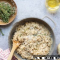 Sweet apple cider and flavorful caramelized onions add the perfect fall twist to this hearty apple cider risotto that's quick to make and goes well with any meal.