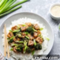 Made completely in the air fryer and perfectly crispy, this sesame tofu and broccoli features tender broccoli and crispy tofu tossed in a flavorful sesame sauce and served over rice.