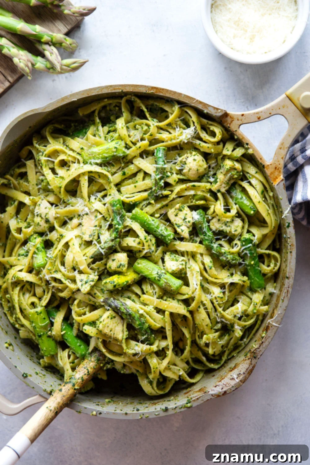 Vibrant Chicken Asparagus Pesto Pasta 6 This chicken asparagus pesto pasta features tender fettuccine pasta tossed with sautéed chicken, asparagus, and lots of flavorful pesto.