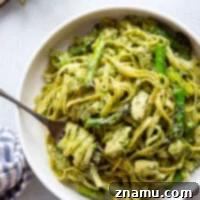 Vibrant Chicken Asparagus Pesto Pasta 8 This chicken asparagus pesto pasta features tender fettuccine pasta tossed with sautéed chicken, asparagus, and lots of flavorful pesto.